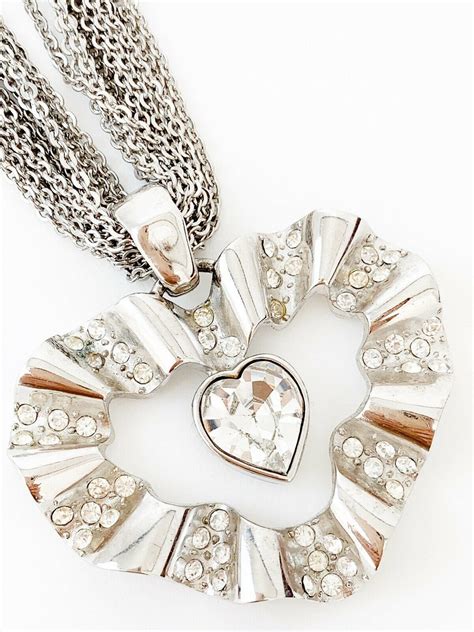 givenchy trui heart|Givenchy necklace.